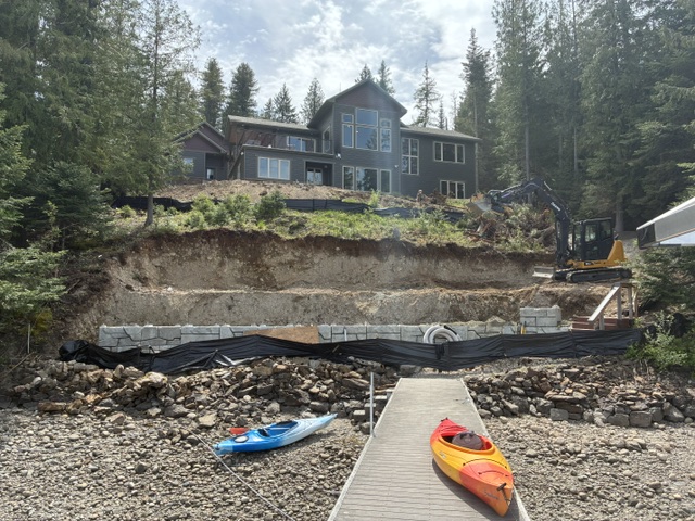 Lakefront hillside excavation and retaining-wall prep
